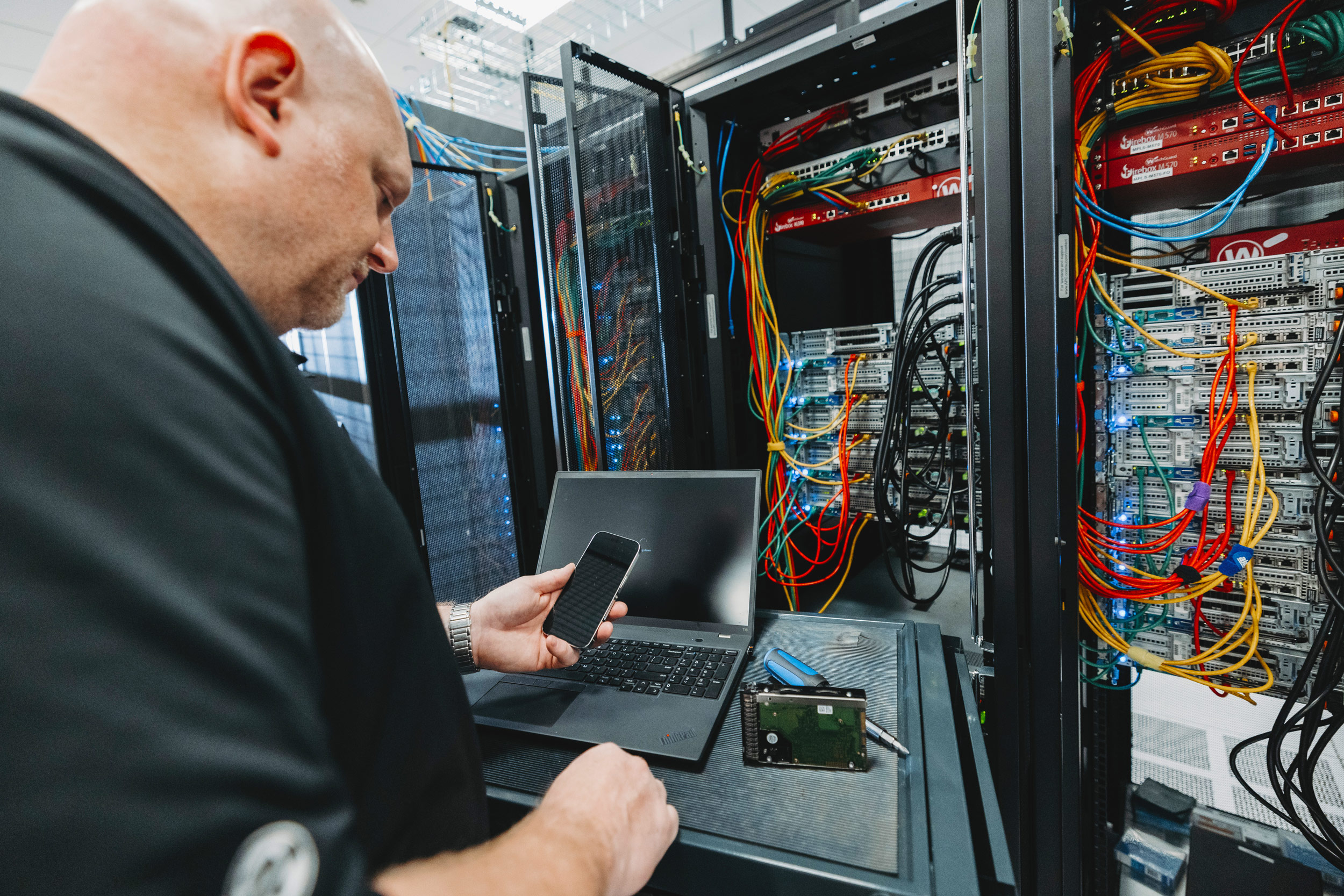 man working in data center 